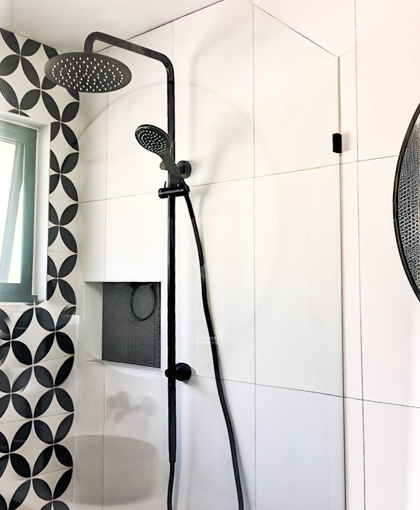 fixed panel shower with black and white feature tile (1)